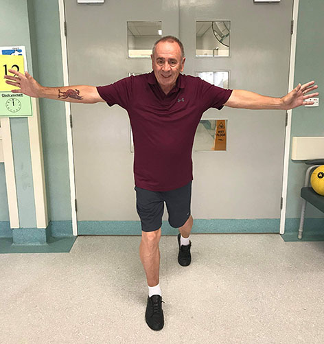 A patients challenging himself during exercise classes led by the OPH Parkinson’s Clinic Physiotherapy team.