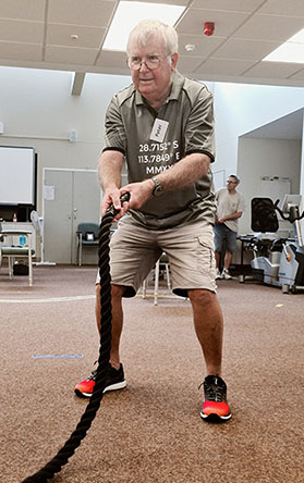 A patients challenging himself during exercise classes led by the OPH Parkinson’s Clinic Physiotherapy team.