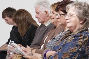 Six people sat in a line