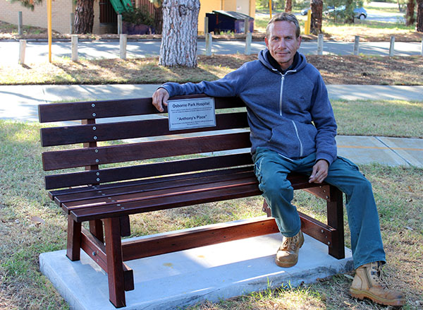 Anthony Ninyette Gardener OPH taking a moment to relax on the new park bench